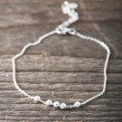 Faith Armband Rörliga Kulor Silver