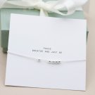 Faith Armband Rörliga Kulor Silver