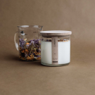 The Munio Soy Wax Candle in glass votive with wooden wicks  Wild flowers with rose 550ml